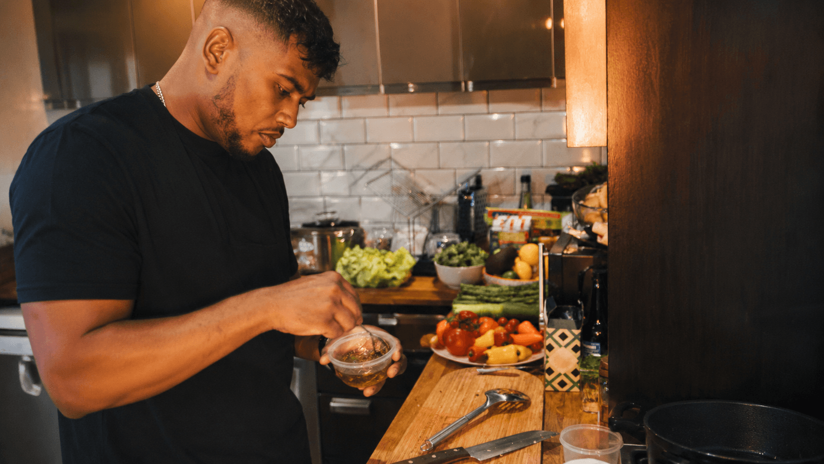 Gavin preparing food in the kitchen